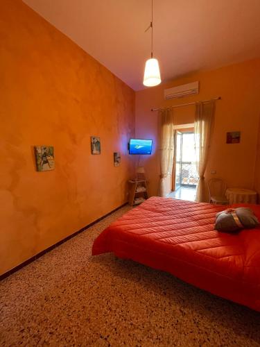 Una cama o camas en una habitación de B&B Fabiola