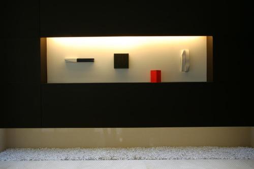 a mirror on a wall in a room at Hotel Brighton City Osaka Kitahama in Osaka