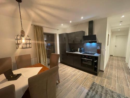 Cucina o angolo cottura di Absolute Active Roulette Apartments Kirchberg