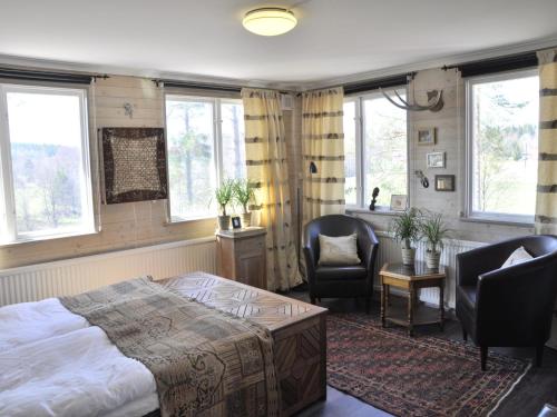 Ein Bett oder Betten in einem Zimmer der Unterkunft Kolmårdsgården B&B