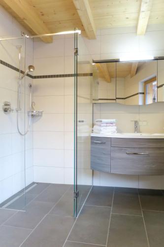 a bathroom with a shower and a sink at Apartment Nina by Interhome in Uderns