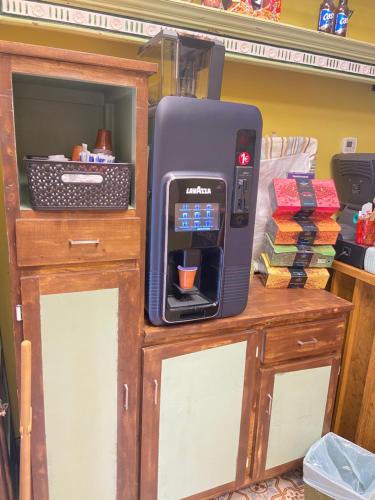 a paper towel dispenser sitting on top of a table at SEÑOR OSO in Molinaseca