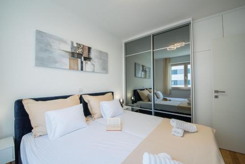 Ένα ή περισσότερα κρεβάτια σε δωμάτιο στο Apartment Astra