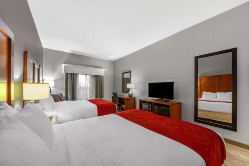 Ένα ή περισσότερα κρεβάτια σε δωμάτιο στο Comfort Inn Kearney I-80