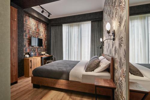 Postel nebo postele na pokoji v ubytování Hotel City