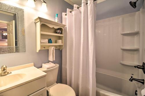 a bathroom with a toilet and a sink and a shower at Beach View, Pool and Tennis Hilton Head Island Unit in Hilton Head Island