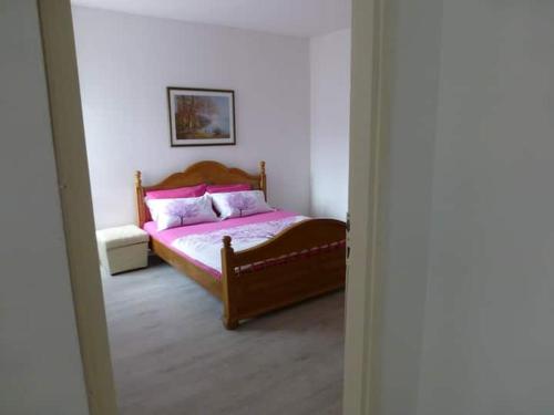 Postel nebo postele na pokoji v ubytování Apartman Igalo Centar