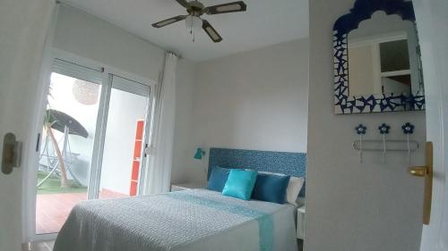 A bed or beds in a room at Apartamento Pardela