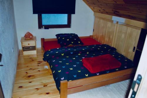 Un pat sau paturi într-o cameră la Vila Gorska