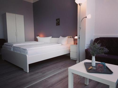 Postel nebo postele na pokoji v ubytování Hotel Villa Fröhlich