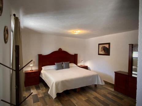 Cama o camas de una habitación en Cabañas Rancho San Jorge