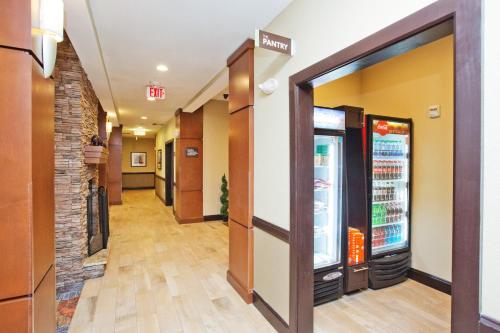 an empty hallway of a hospital with a refrigerator at Staybridge Suites Austin South Interstate Hwy 35 by IHG in Austin
