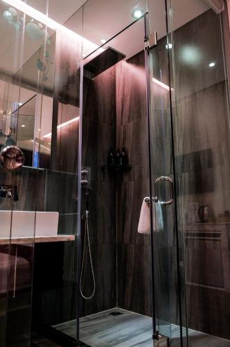 Koupelna v ubytování Signature Boutique Hotel