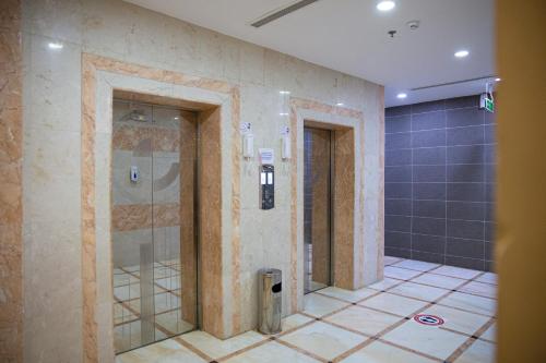 Vonios kambarys apgyvendinimo įstaigoje الجوهرة الأولى للوحدات السكنية - حي الحمدانية