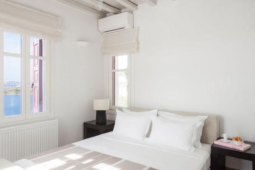 Postel nebo postele na pokoji v ubytování Villa Eirene Agl Psarrou Mykonos
