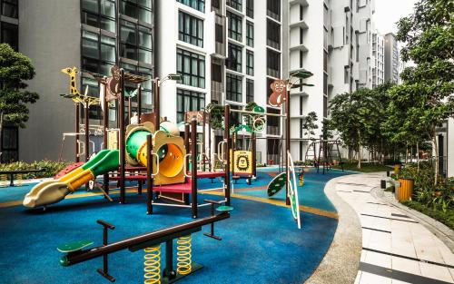 a playground in the middle of a building with at H20 Residence Ara Damansara by Airhost in Petaling Jaya