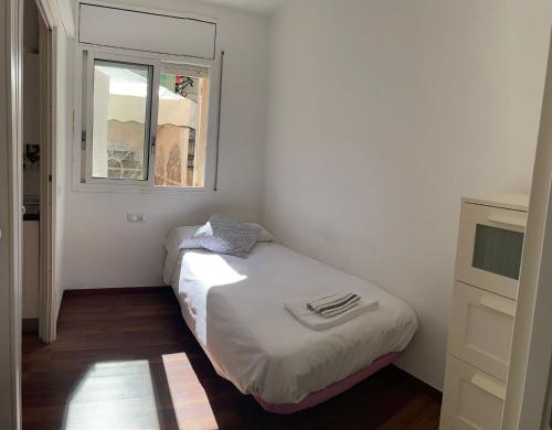 Postel nebo postele na pokoji v ubytování Apartamento con gran terraza cerca de la playa