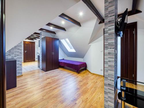 Postel nebo postele na pokoji v ubytování Willa Malinowscy