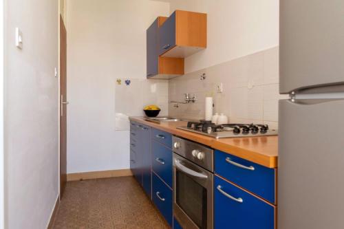 Kuchyň nebo kuchyňský kout v ubytování Apartment Mirela
