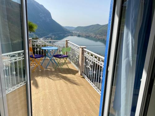 a balcony with a view of a lake at Casa Belvedere in Rovio