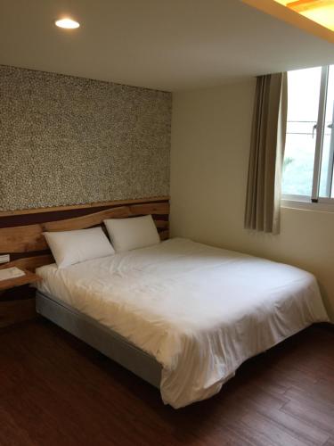 知本正好運溫泉民宿 房間的床