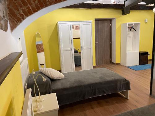 מיטה או מיטות בחדר ב-Atene del Canavese
