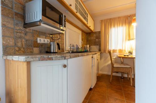 Una cocina o cocineta en Appartementanlage am Arnumer See
