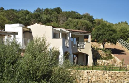 a villa with a view of the house at Piccolo Hotel - Adults Only in Porto Ottiolu