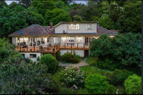 an aerial view of a large house with a deck at Mountain Villa in Dandenong Ranges in Mount Dandenong