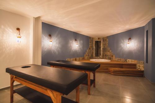 a bathroom with a sink and a bath tub at Eco Marine Residence in Kargicak