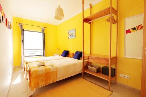 Cama o camas de una habitación en Casa a Sul - Lagos Guesthouses