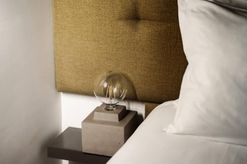 Ένα ή περισσότερα κρεβάτια σε δωμάτιο στο 19 ROOMS