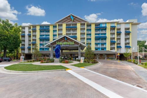 a hotel with a large building in front of it at Margaritaville Resort Gatlinburg in Gatlinburg