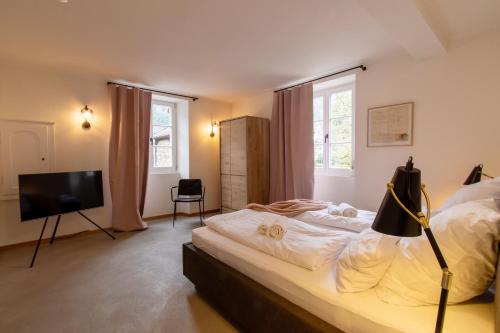 เตียงในห้องที่ Ferienhaus Martinshof