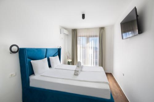 Una cama o camas en una habitación de Villa Lazy Hill