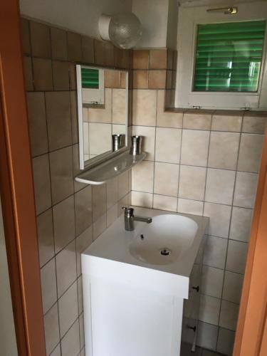Kúpeľňa v ubytovaní Arácsi házikó