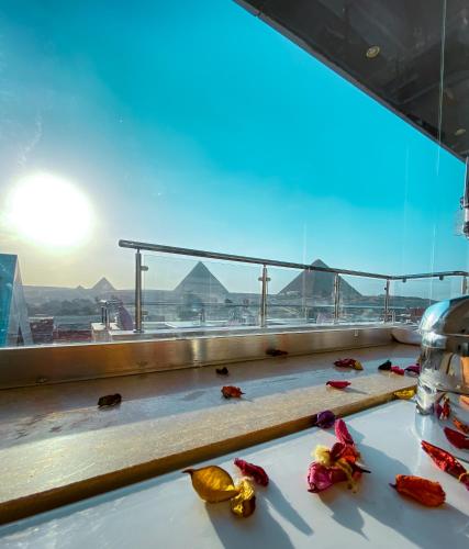 a view of the pyramids from the top of the observation deck athenshens at Best View Pyramids Hotel in Cairo