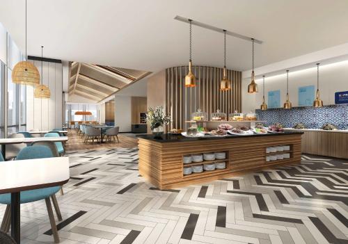 a rendering of a lobby with a buffet at Holiday Inn Express Dali Xiaguan by IHG in Dali