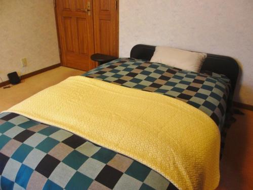 Ένα ή περισσότερα κρεβάτια σε δωμάτιο στο Gairoju / Vacation STAY 2561