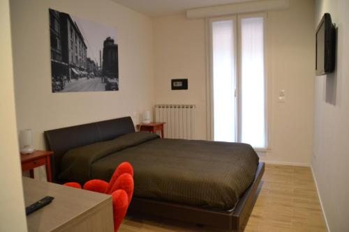 A bed or beds in a room at B&B Dell'Orso - Affittacamere - Guest house