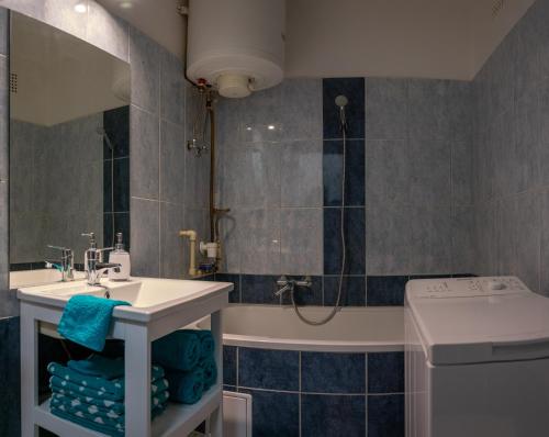 Et badeværelse på Silentium City Apartman Sárvár