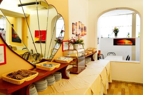 Room in Guest room - New Hotel Cirene Quadruple Room 4 people with breakfast