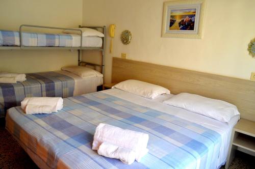 Room in Guest room - New Hotel Cirene Big Quadruple Room 4 people with half pension package