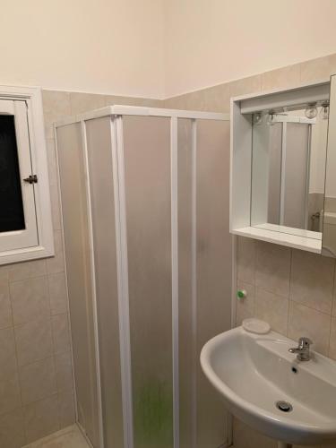 a bathroom with a shower and a sink at Eden MONOLOCALE Torre dell Orso in Torre dell'Orso