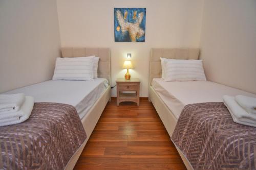 Postel nebo postele na pokoji v ubytování Casa D' Oro Corfu