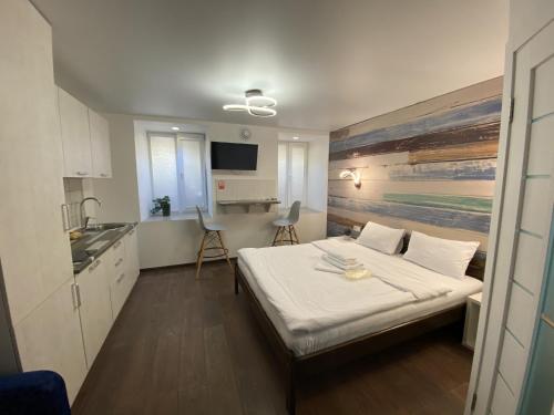 Posteľ alebo postele v izbe v ubytovaní Apartments on Chaykovskogo 16