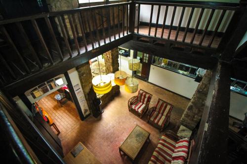 an overhead view of a living room with furniture at Pousada Bartholomeu in Paraty