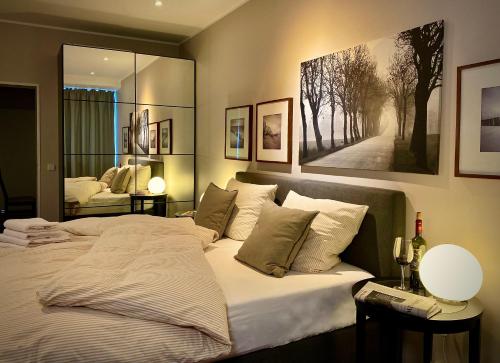 Postel nebo postele na pokoji v ubytování CityHomeMunich