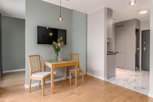 TV a/nebo společenská místnost v ubytování Dream4You Apartments