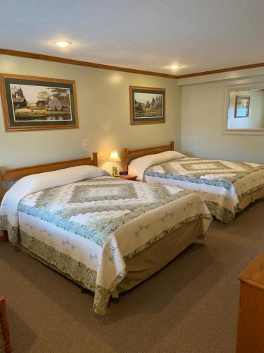 Postel nebo postele na pokoji v ubytování The Garrett Inn